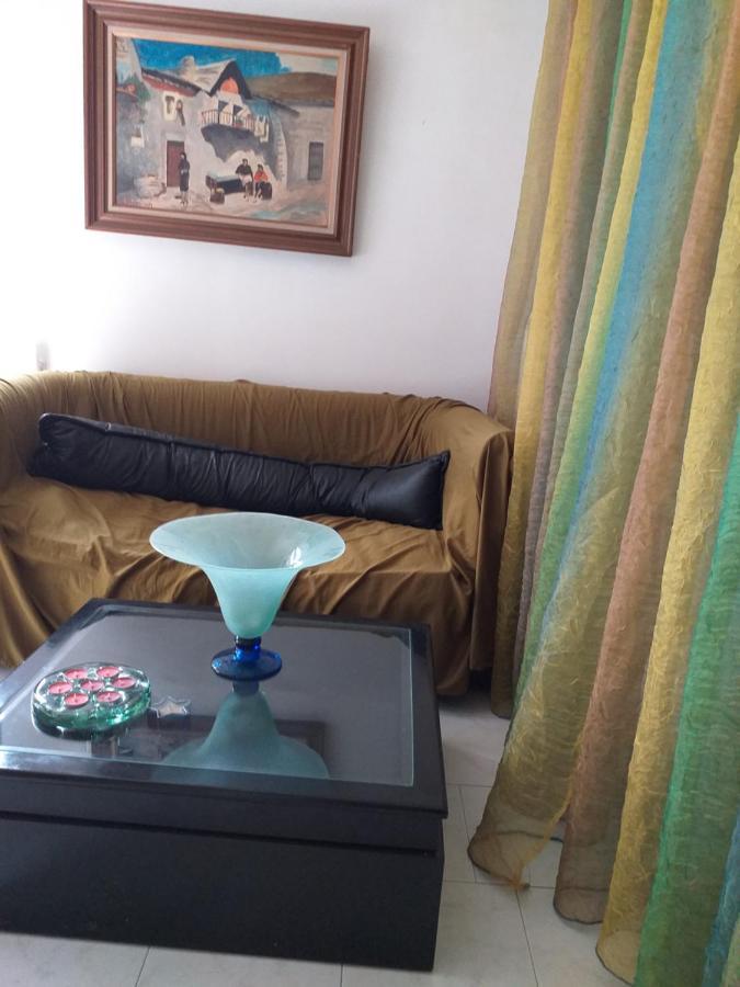 Roulas Cozy Apartments Artemida  Bagian luar foto